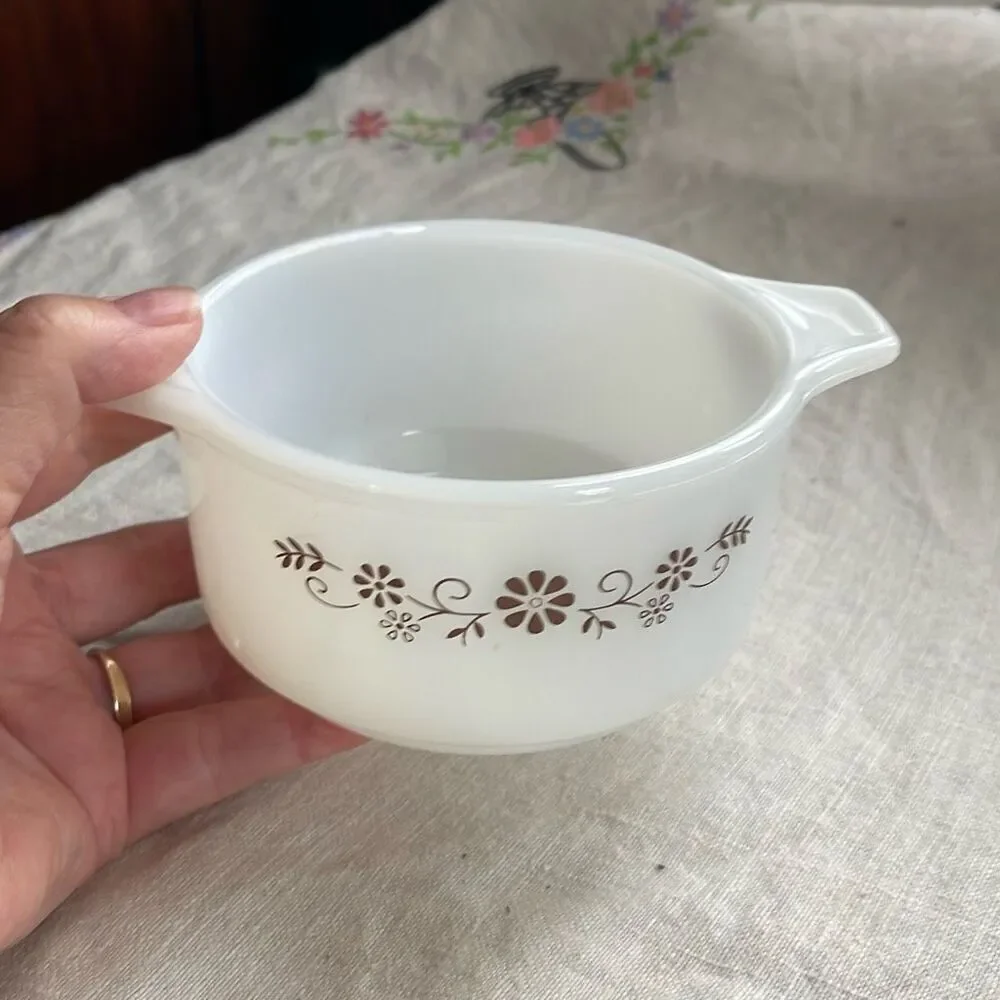 Vintage brown Daisy Dynaware Pyr-O-Rey casserole dish.